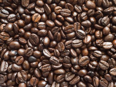 kavrulmuş kahverengi kahve çekirdekleri,-ebilmek var olmak kullanılmış bir arka plan ve doku olarak