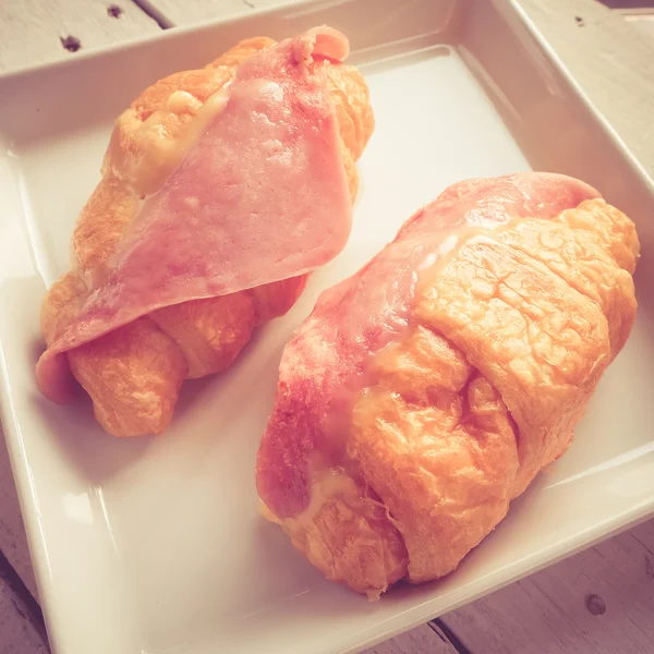 Croissant ham with filter effect retro vintage style — Stock Photo, Image