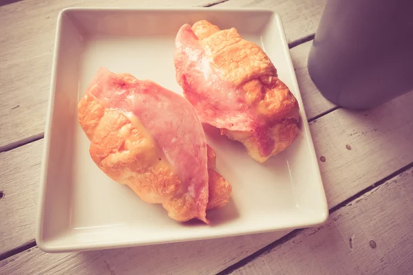 Croissant ham with filter effect retro vintage style — Stock Photo, Image