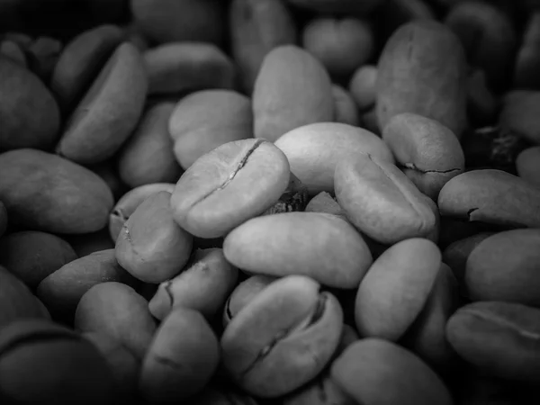 Black and white coffee beans — Stock Photo, Image