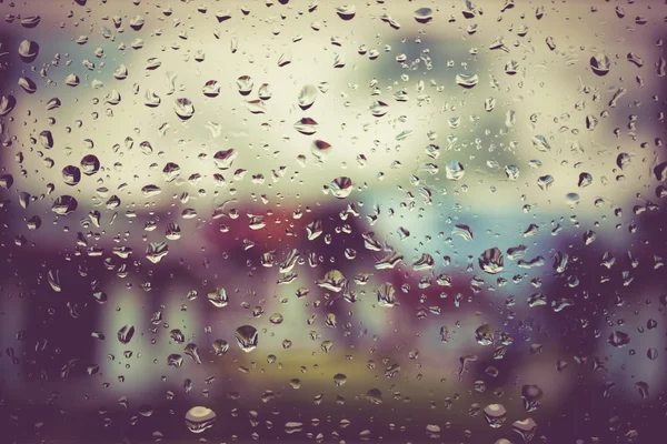 Drops of rain on glass with filter effect retro vintage style — Stock Photo, Image