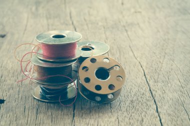 Filtre etkisi retro vintage ile ahşap arka plan iş parçacığı rulo