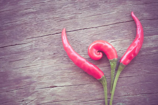 Red hot chili peppers with filter effect retro vintage style — Stock Photo, Image