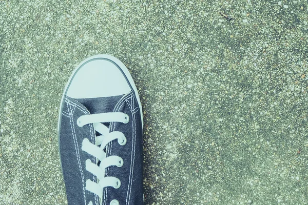 Black sneakers with filter effect retro vintage style — Stock Photo, Image