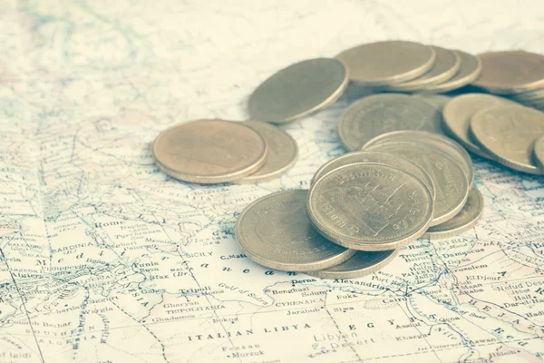 Coin and a map  with filter effect retro vintage style — Stock Photo, Image