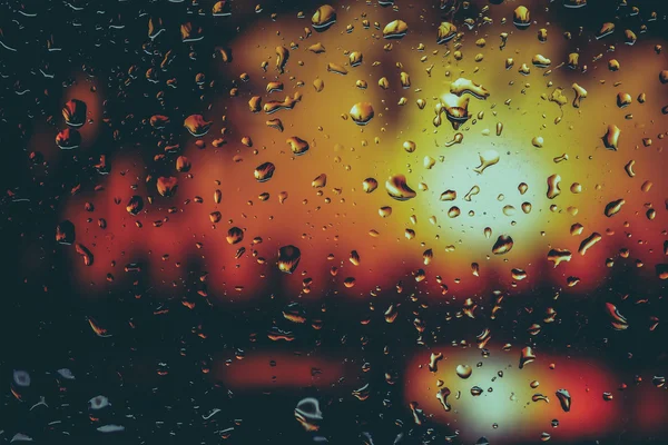 Druppels regen op glas met filter effect retro vintage stijl — Stockfoto
