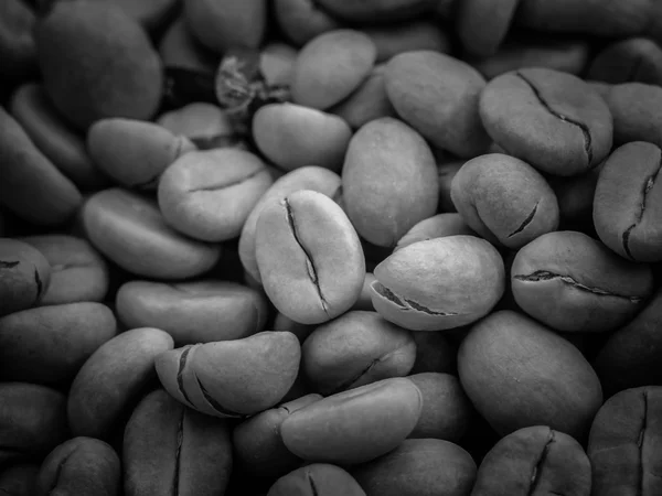 Black and white coffee beans — Stock Photo, Image