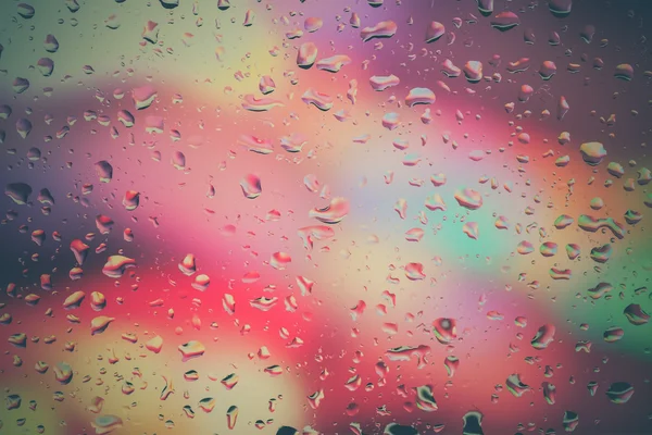 Drops of rain on glass with filter effect retro vintage style — Stock Photo, Image