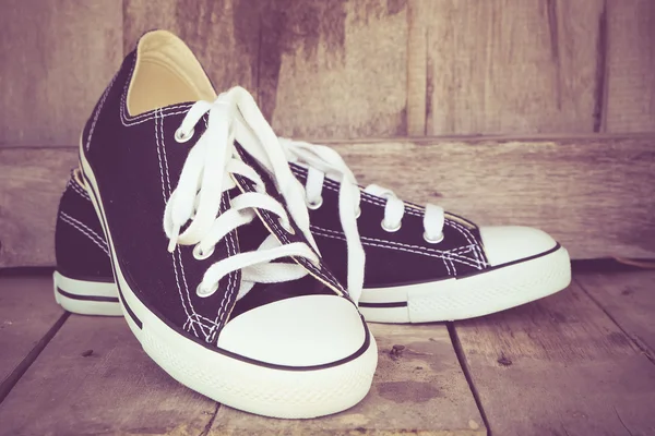 Svarta sneakers med filter effekt retro vintage stil — Stockfoto