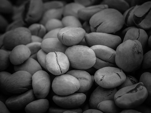 Black and white coffee beans — Stock Photo, Image