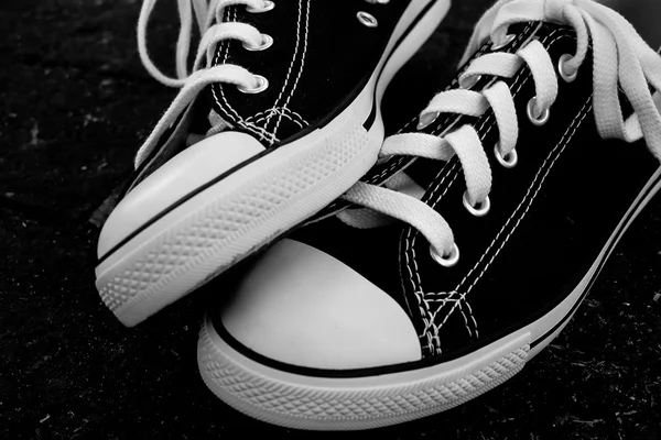Zapatillas negras con efecto filtro estilo retro vintage —  Fotos de Stock