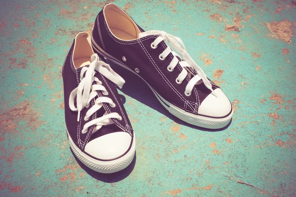 Black sneakers with filter effect retro vintage style — Stock Photo, Image