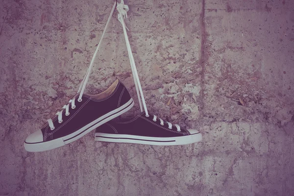 Svarta sneakers med filter effekt retro vintage stil — Stockfoto