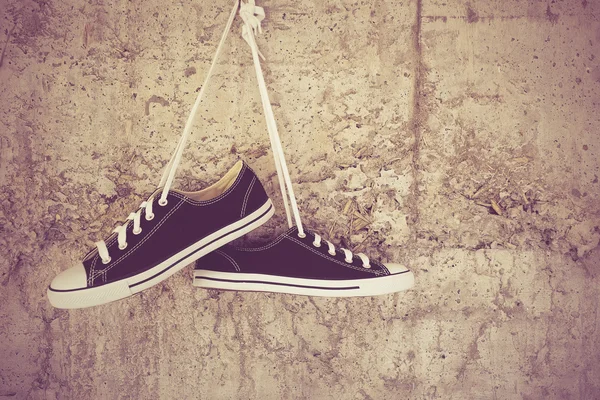 Black sneakers with filter effect retro vintage style — Stock Photo, Image