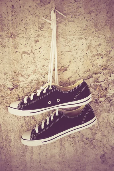 Black sneakers with filter effect retro vintage style — Stock Photo, Image