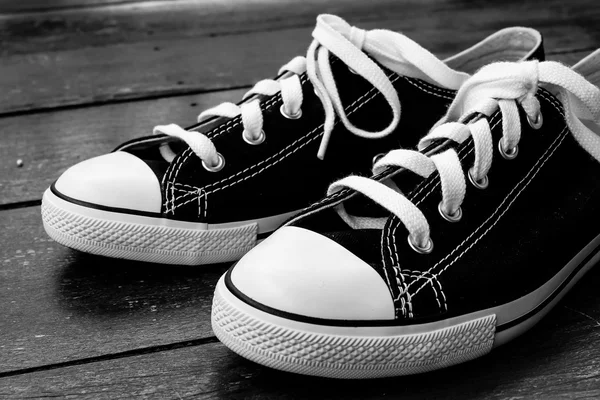 Black sneakers with filter effect retro vintage style — Stock Photo, Image