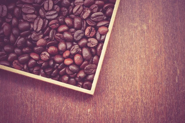 Granos de café con efecto de filtro retro estilo vintage —  Fotos de Stock