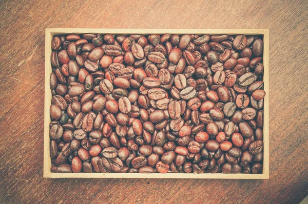 Кофе-бобы с эффектом фильтра ретро винтажный стиль — стоковое фото