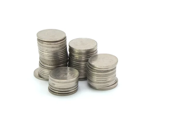 Pila de monedas sobre fondo blanco —  Fotos de Stock