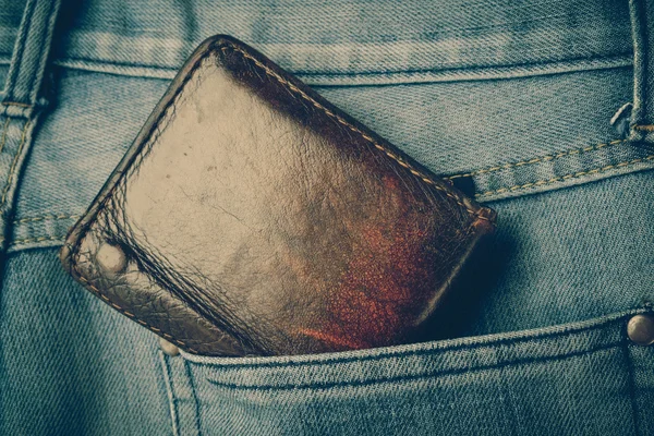 Wallet and jean with filter effect retro vintage style — Stock Photo, Image