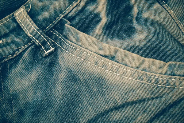 Jeans textura fondo con efecto filtro estilo vintage retro — Foto de Stock