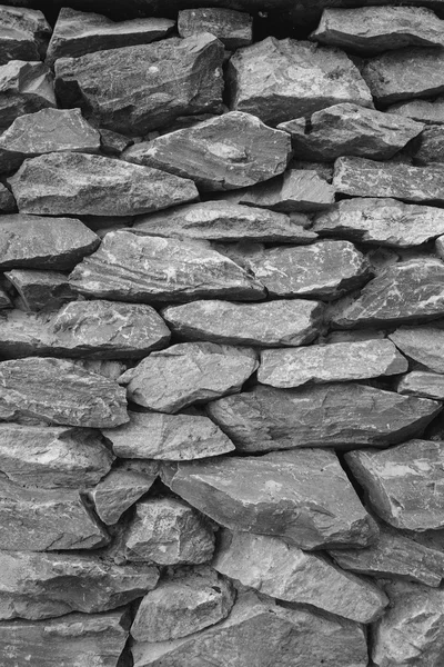 Fondo de piedra de pared negro — Foto de Stock