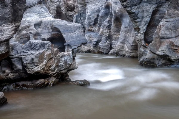 Creek flowing over the rocks — Stock Photo, Image