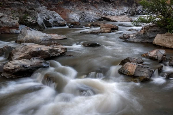 Creek flowing over the rocks — Stock Photo, Image