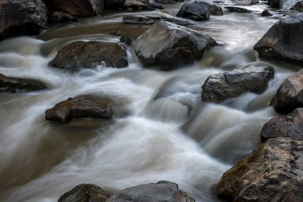 Creek flowing over the rocks — Stock Photo, Image