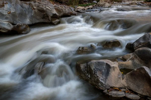 Creek flowing over the rocks — Stock Photo, Image