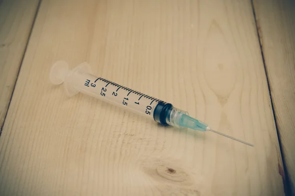 Syringe with filter effect retro vintage style — Stock Photo, Image