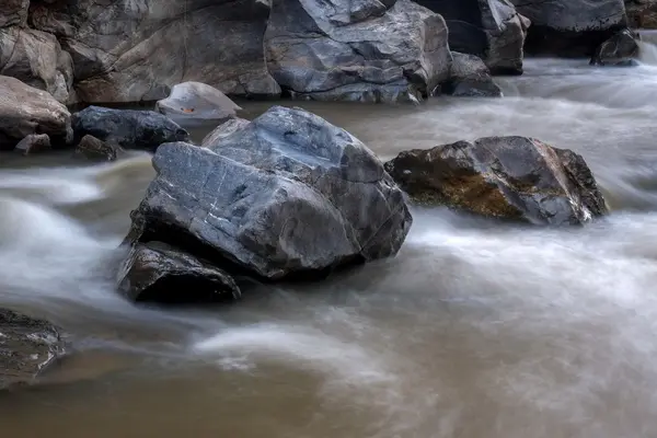 Creek flowing over the rocks — Stock Photo, Image