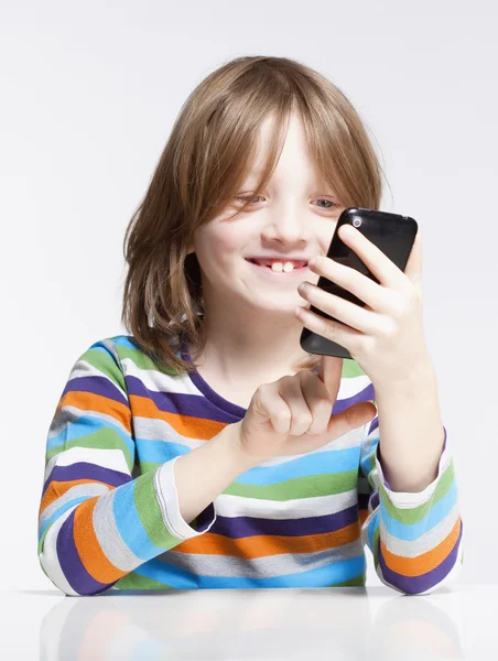 Boy Reading Text Message on Mobile Phone — Stock Photo, Image