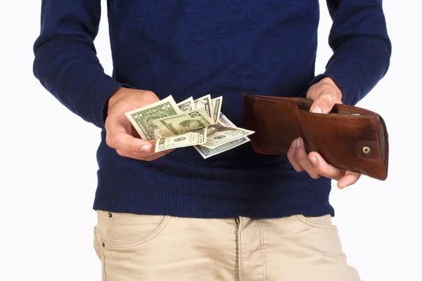 Hombre con cartera y dólares en las manos — Foto de Stock