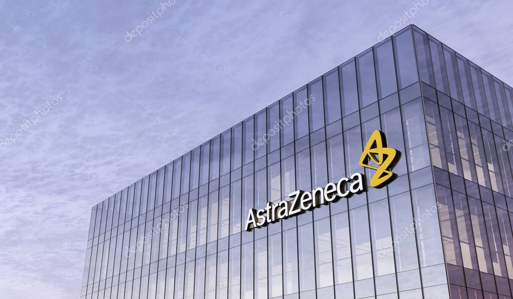 Cambridge, United Kingdom. February 16, 2021. Editorial Use Only, 3D CGI. Pharmaceutical Company Astrazeneca Signage Logo on Top of Glass Building. Workplace in High-rise Office Headquarter at Night Time.