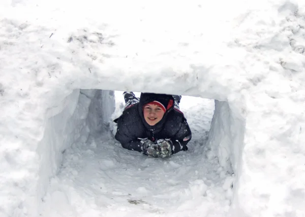 Boy in Snow Tunnel — Stock Photo, Image