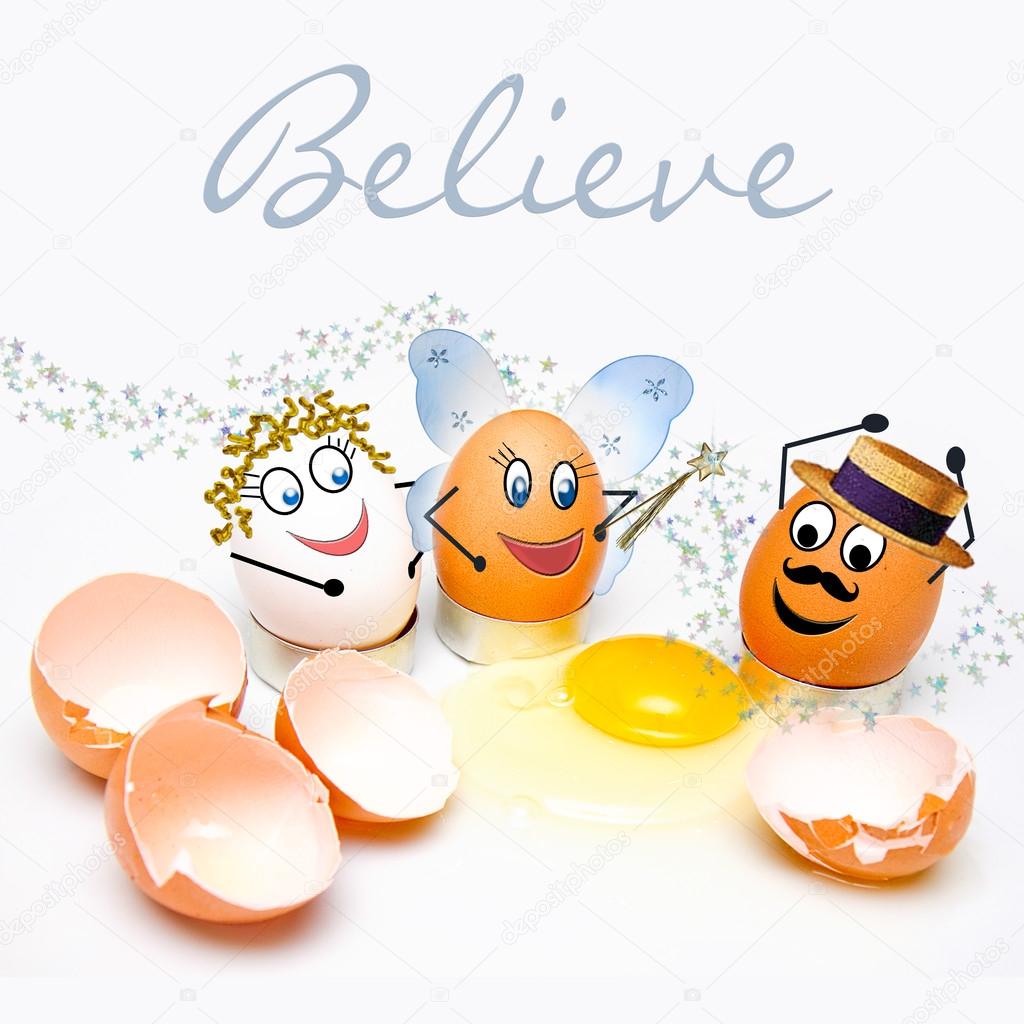 Eggs with faces surrounding broken Shells Text:   Believe