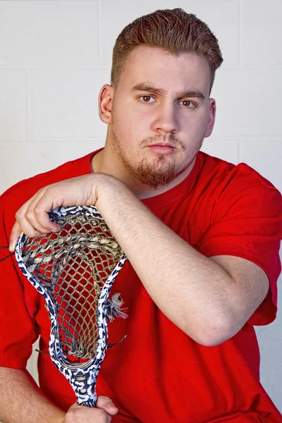 Senior High School Student och Lacrosse Stick — Stockfoto