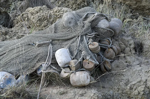 Fishing net lying on the shore — Stock Photo, Image