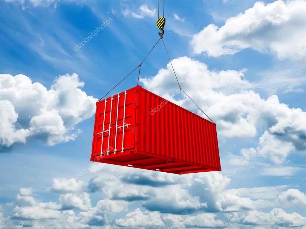Freight shipping container hanging on crane