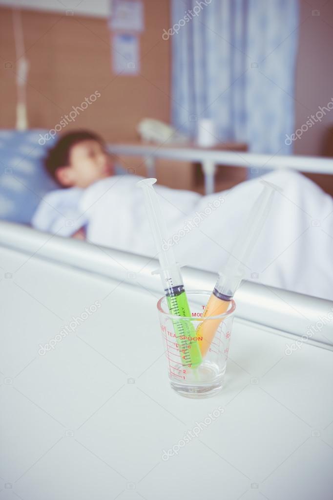 Spuiten in een beker