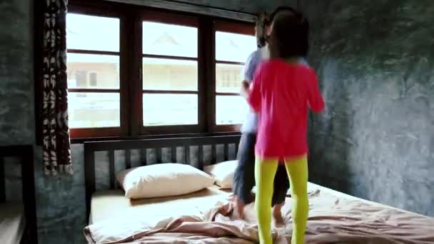 Happy Asian Children Having Fun Jumping Playing Bed Brother Sister — Stock Video