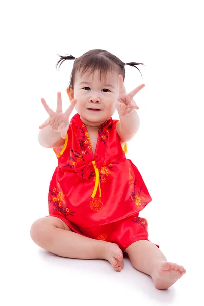 Little asian girl (thai) in traditional chinese cheongsam — Stock Photo, Image