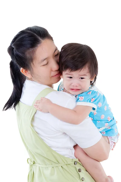 Asian mother carrying and soothe her daughter on white backgroun — Stock Photo, Image