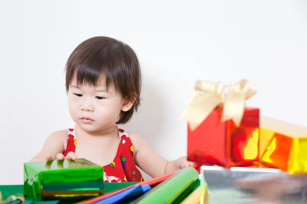 Adorable little girl with present — Stock Photo, Image