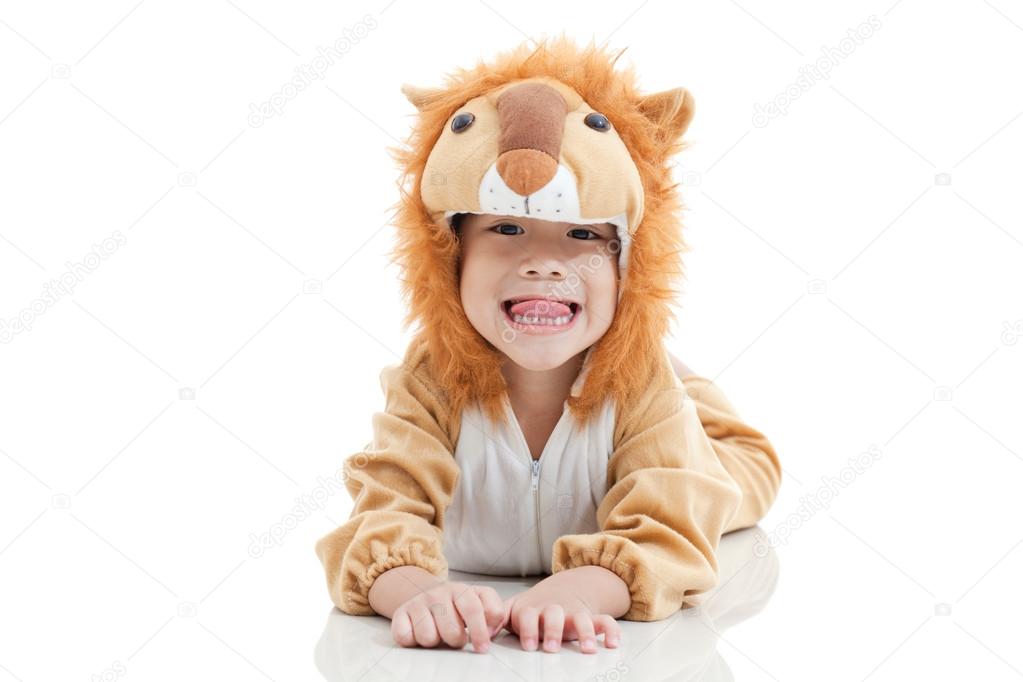 Cute little boy dressed in lion suit