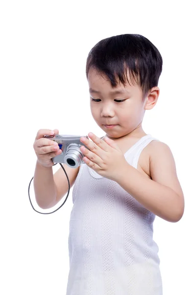 Little boy  interesting digital compact photo camera — Stock Photo, Image