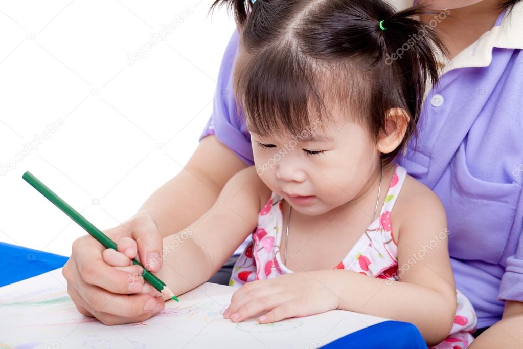 Mother with child girl draw and paint together