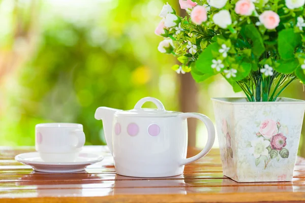 White porcelain set for tea or coffee on wooden table — Stock Photo, Image