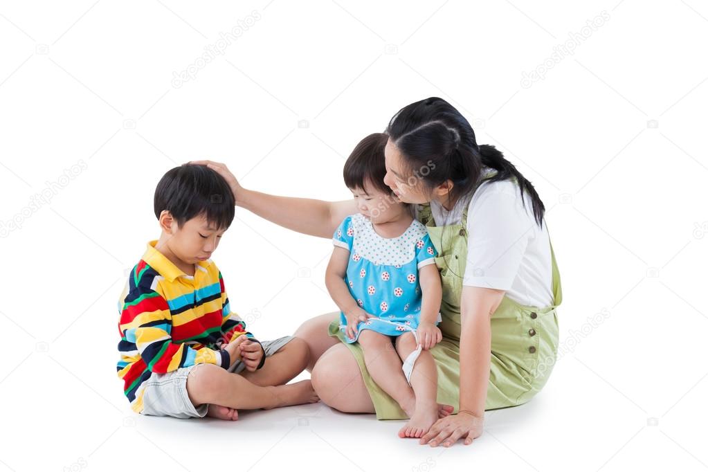 mother with two little asian (thai) children (full body). Isolat